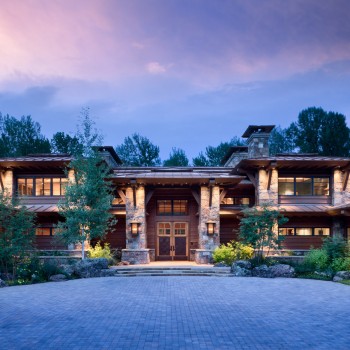 Exterior, horizontal, partial front view with entry at twilight, Dondero residence, Ketchum, Idaho; McLaughlin & Associates; Arentz Landscape Architects