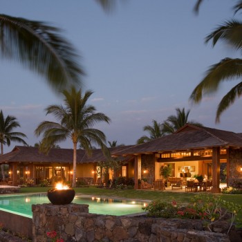 Exterior, horizontal, late twilight rear elevation with negative edge pool and fire post and torchs, Lot #86, Manini'owali Kuki'o Golf Course, Hawaii